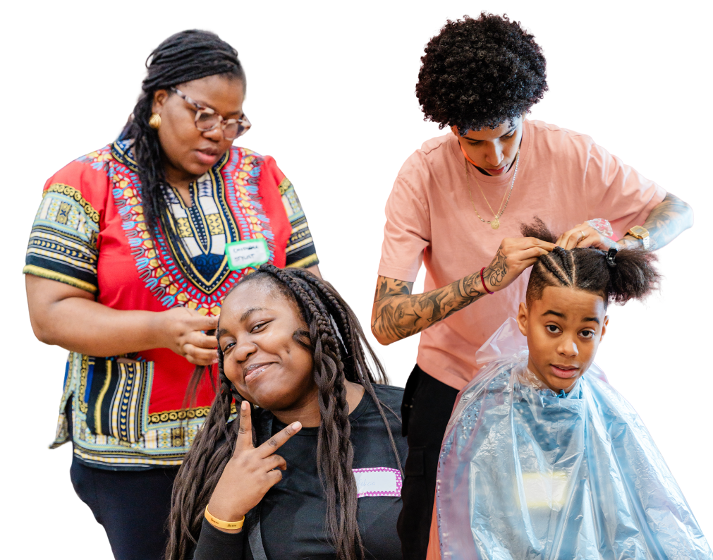 Two hair stylists braiding children's hair